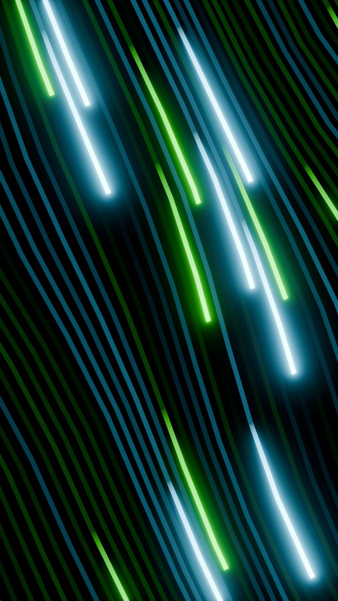 Abstract streaks of neon blue and green light